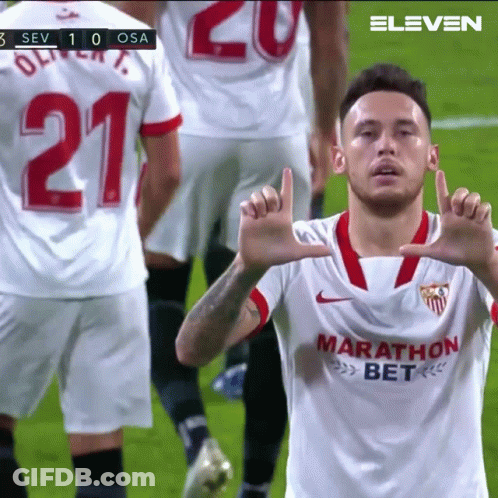 A Soccer Player Wearing A White Jersey With The Word Marathon On It GIF