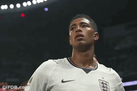 A Soccer Player Wearing A White Nike Jersey With A Lion On The Front GIF