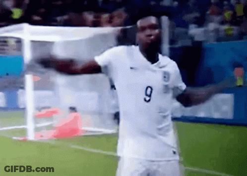 A Soccer Player Wearing A White Number 9 Jersey GIF
