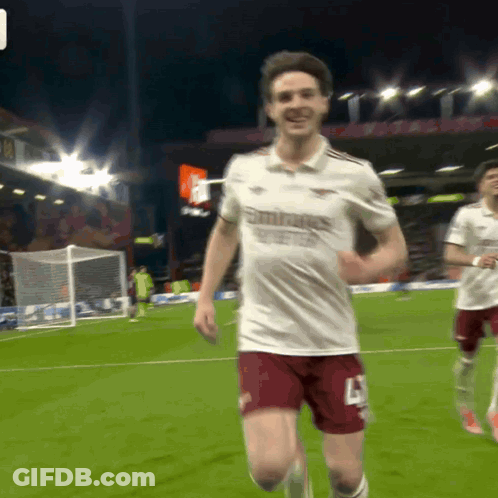 A Soccer Player Wearing A White Shirt That Says Emirates GIF