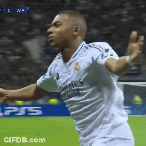 A Soccer Player Wearing A White Shirt That Says Fly Emirates GIF