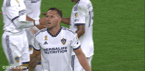 A Soccer Player Wearing A White Shirt That Says Herbalife Nutrition On It GIF