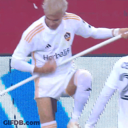 A Soccer Player Wearing A White Shirt That Says Herbalife On It GIF