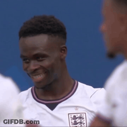 A Soccer Player Wearing A White Shirt With A Lion On It GIF