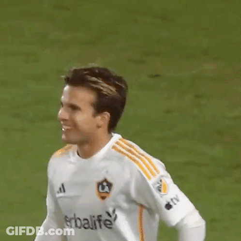 A Soccer Player Wearing A White Shirt With Herbalife On It GIF