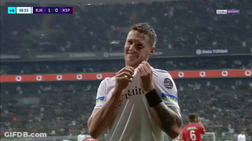 A Soccer Player Wearing A White Shirt With Rain On It GIF