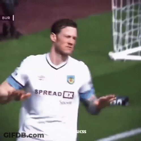 A Soccer Player Wearing A White Shirt With Spread Fx On It GIF