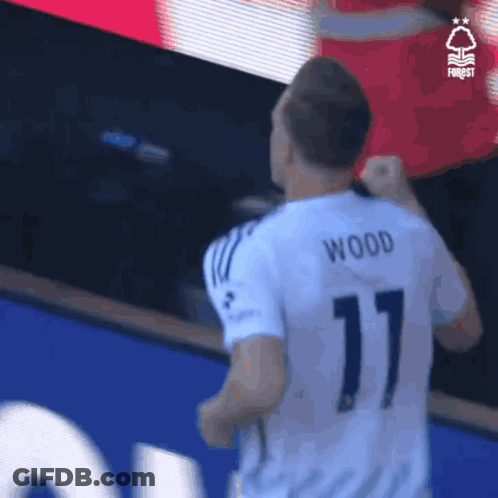 A Soccer Player Wearing A White Shirt With The Number 11 On It GIF