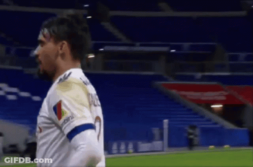 A Soccer Player Wearing A White Shirt With The Number 2 On It GIF