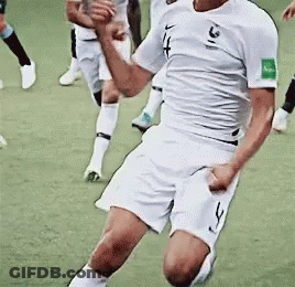 A Soccer Player Wearing A White Shirt With The Number 31 On The Sleeve GIF