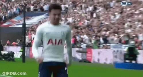A Soccer Player Wearing A White Shirt With The Word Aia On It Is Running On A Field . GIF