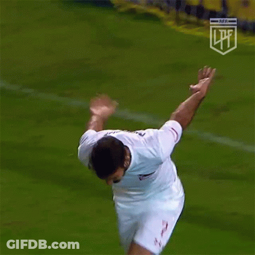 A Soccer Player Wearing A White Under Armour Jersey Is Running On The Field GIF