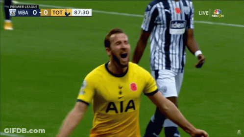 A Soccer Player Wearing A Yellow Aia Jersey Celebrates On The Field GIF