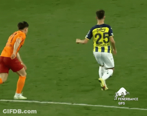 A Soccer Player Wearing A Yellow And Blue Jersey With The Number 25 GIF