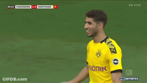 A Soccer Player Wearing A Yellow Bvb Jersey GIF