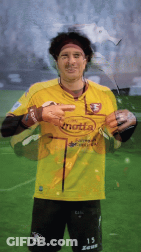 A Soccer Player Wearing A Yellow Jersey That Says Motta GIF