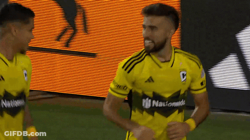 A Soccer Player Wearing A Yellow Jersey That Says Nationals On It GIF