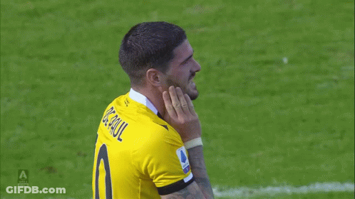 A Soccer Player Wearing A Yellow Jersey That Says Serie A GIF