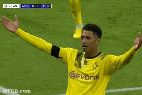 A Soccer Player Wearing A Yellow Jersey That Says Sevdok GIF