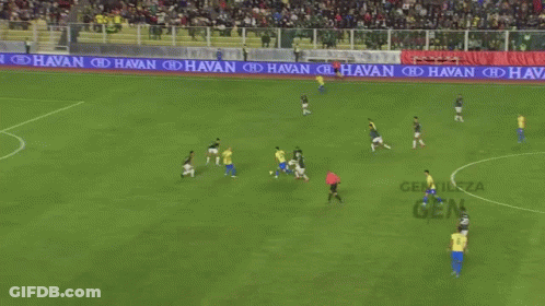 A Soccer Player Wearing A Yellow Jersey With The Number 1 On It GIF