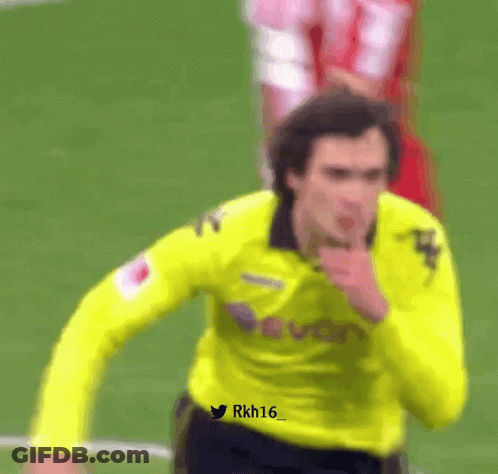 A Soccer Player Wearing A Yellow Jersey With The Number 16 On The Front GIF