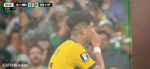 A Soccer Player Wearing A Yellow Jersey With The Number 4 On It GIF
