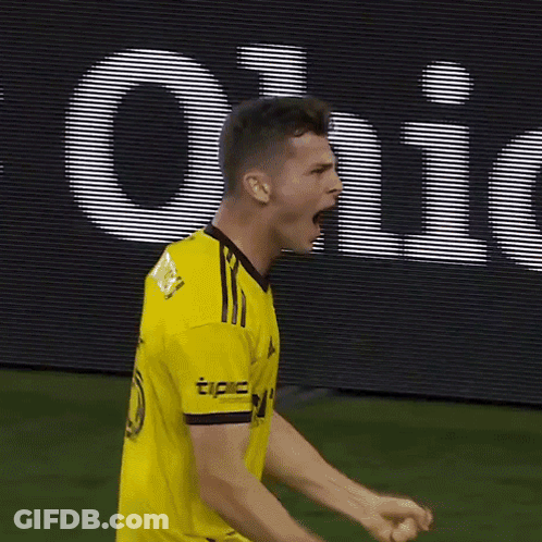A Soccer Player Wearing A Yellow Jersey With The Word Tipc On The Sleeve GIF