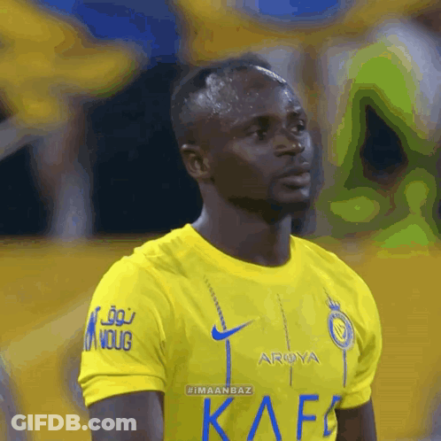A Soccer Player Wearing A Yellow Shirt That Says Arya On It GIF
