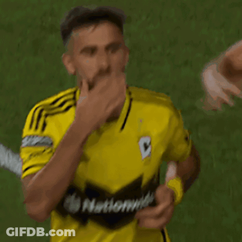 A Soccer Player Wearing A Yellow Shirt That Says National On It GIF