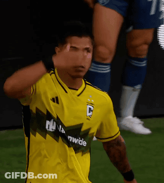 A Soccer Player Wearing A Yellow Shirt That Says Worldwide GIF