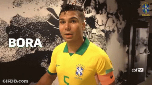 A Soccer Player Wearing A Yellow Shirt With The Number 5 On It GIF