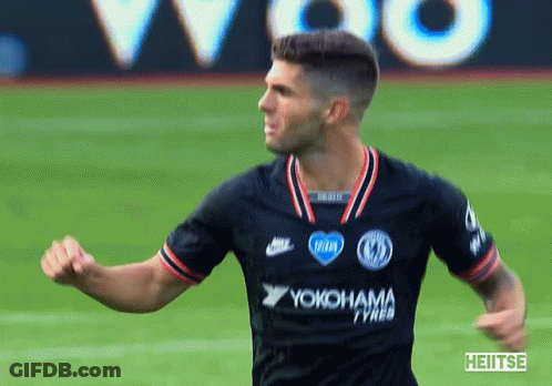 A Soccer Player Wearing A Yokohama Jersey Celebrates On The Field GIF