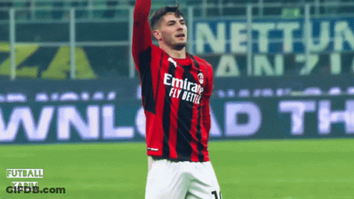 A Soccer Player Wearing An Emirates Fly Better Jersey Celebrates GIF
