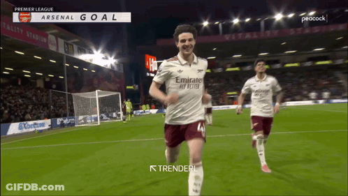 A Soccer Player Wearing An Emirates Fly Better Jersey Is Running On A Field GIF