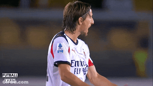 A Soccer Player Wearing An Emirates Fly Shirt GIF