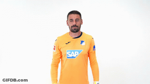 A Soccer Player Wearing An Orange Shirt With The Word Sap On It GIF