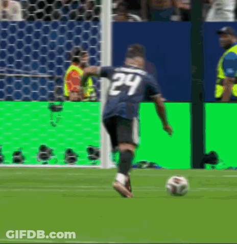 A Soccer Player Wearing Number 24 Kicks The Ball GIF