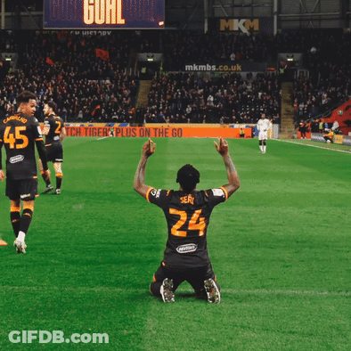 A Soccer Player Wearing Number 24 Kneeling On The Field GIF