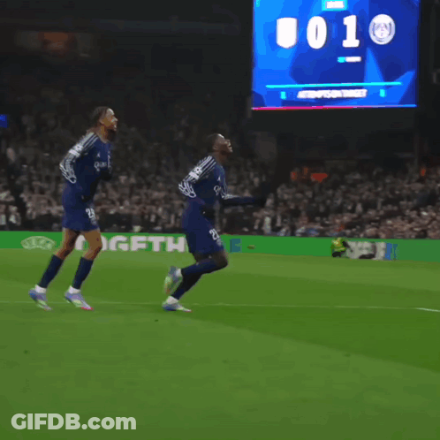 A Soccer Player Wearing Number 25 Is Kneeling On The Field GIF