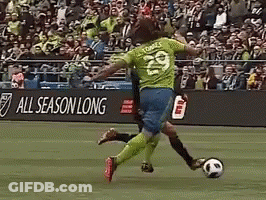 A Soccer Player Wearing Number 29 Is Kicking The Soccer Ball GIF