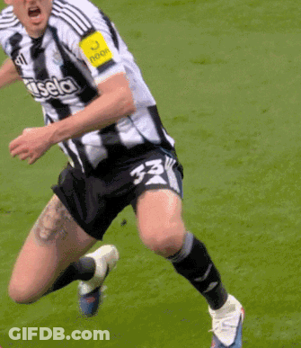 A Soccer Player Wearing Number 33 Is Running On The Field GIF