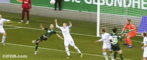 A Soccer Player Wearing Number 5 Jumps In The Air GIF