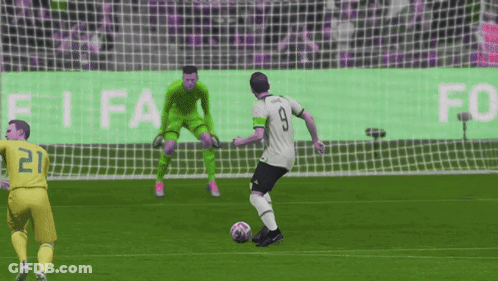 A Soccer Player Wearing Number 9 Kicks The Ball GIF