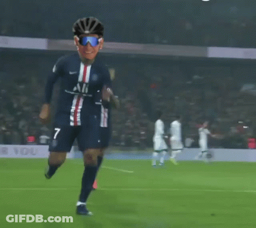 A Soccer Player Wearing Sunglasses And A Helmet With The Number 7 On His Jersey GIF