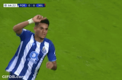 A Soccer Player Wipes His Face With His Hand During A Game GIF