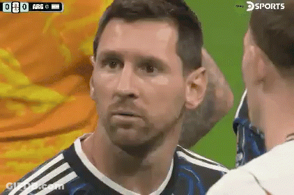 A Soccer Player With A Beard Is Talking To Another Player On A Field . GIF