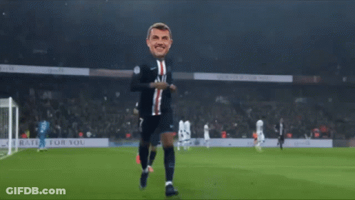 A Soccer Player With A Mask On His Head Is Running On A Field GIF
