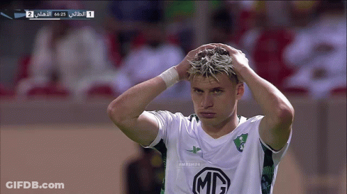 A Soccer Player With A Mc Logo On His Shirt Holds His Head GIF