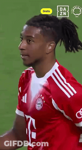 A Soccer Player With Dreadlocks Is Wearing A Red Shirt With The Number 7 On It GIF