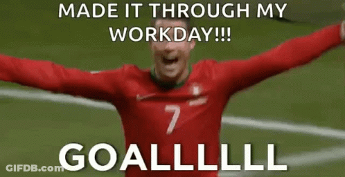 A Soccer Player With His Arms Outstretched Is Celebrating A Goal . GIF